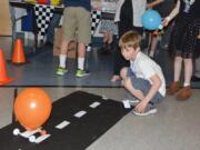 Washougal: Gause Elementary School third-grader Derek Ager won first place in the Science Night competition for his project, “Magnetic Tractor Pull.”