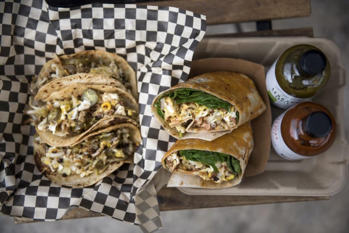 The taco-style ABQ, left, and the burrito-style Couve-Delish, at Mack Shack in downtown Vancouver.