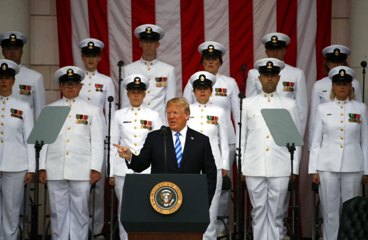 President Donald Trump pauses at the podium as he arrives for a ceremony at the Memorial Amphitheater in Arlington National Cemetery on Memorial Day, Monday, May 28, 2018, in Arlington, Va.(AP Photo/Alex Brandon)