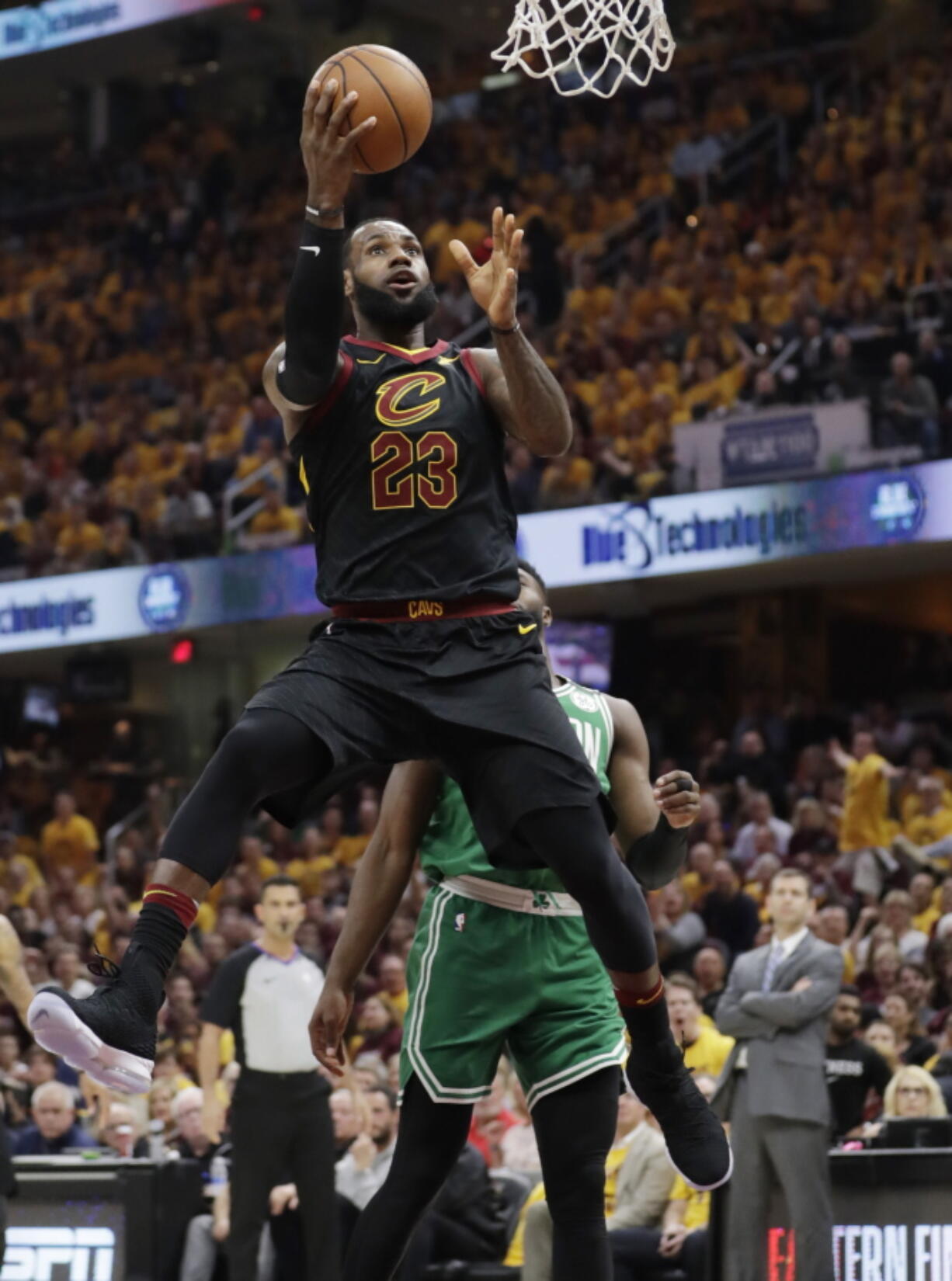 Cleveland Cavaliers’ LeBron James (23) shoots against the Boston Celtics in the first half of Game 3 of the NBA basketball Eastern Conference finals, Saturday, May 19, 2018, in Cleveland.