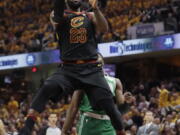 Cleveland Cavaliers’ LeBron James (23) shoots against the Boston Celtics in the first half of Game 3 of the NBA basketball Eastern Conference finals, Saturday, May 19, 2018, in Cleveland.