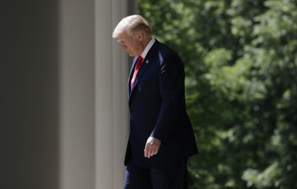 President Donald Trump walks out to speak during a “National Day of Prayer” event in the Rose Garden of the White House on Thursday in Washington.