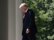 President Donald Trump walks out to speak during a “National Day of Prayer” event in the Rose Garden of the White House on Thursday in Washington.