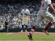 Seattle Mariners starting pitcher Felix Hernandez stands on the mound as Los Angeles Angels’ Chris Young rounds the bases after hitting a solo home run in the second inning of a baseball game, Sunday, May 6, 2018, in Seattle. (AP Photo/Ted S.