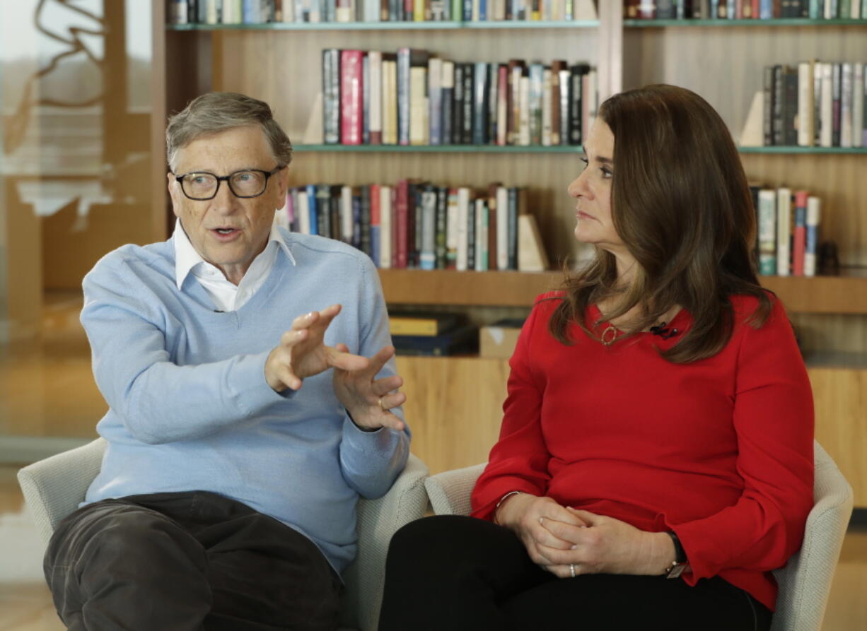 Microsoft co-founder Bill Gates and his wife, Melinda, take part in an AP interview on Feb. 1 in Kirkland. The nonprofit Bill and Melinda Gates Foundation has given about $44 million to outside groups over the past two years to help shape new state education plans required under the 2015 law, according to an Associated Press analysis of its grants.