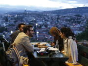 A group of people break their fast on the first day of the fasting month of Ramadan, on an old fortress overlooking the historic center of Sarajevo, Bosnia, on Wednesday. Muslim Bosniaks make up around 40 percent of Bosnia’s population of 3.8 million. Many of them celebrate Muslim holy month of fasting during which they abstain from food, drink and smoking from sunrise to sunset.