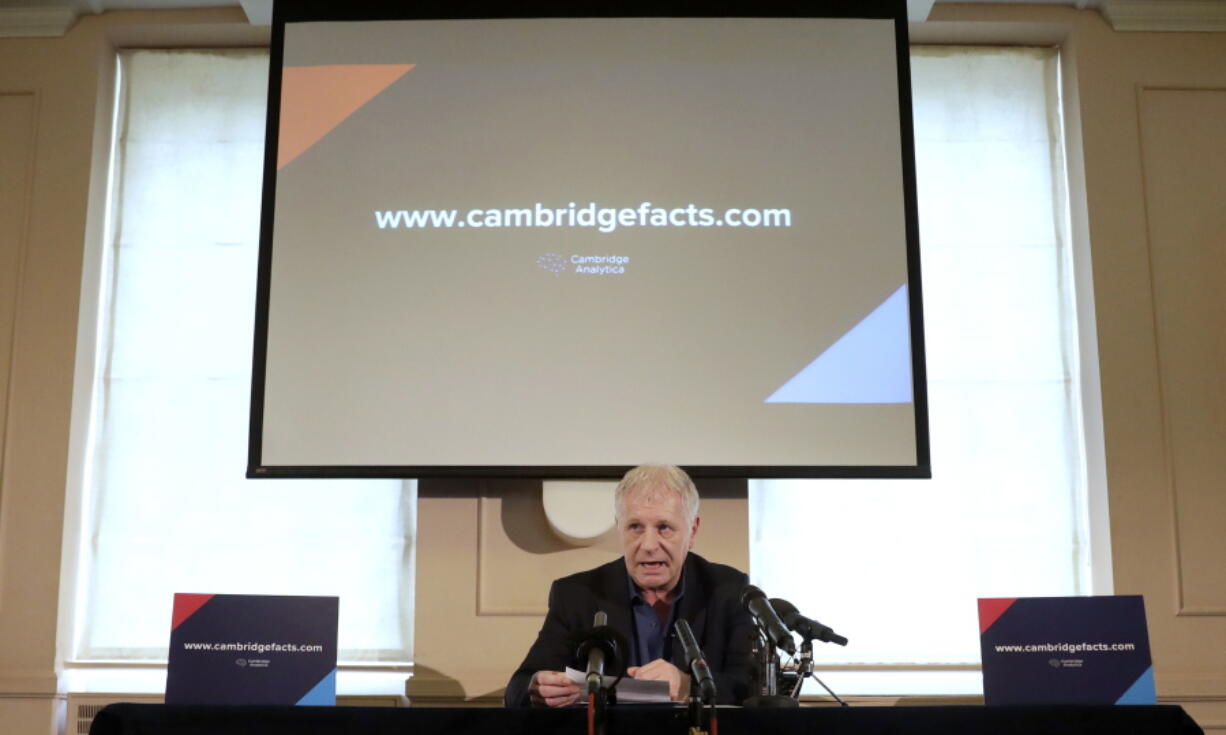 FILE - In this April 24, 2018 file photo, Cambridge Analytica spokesperson Clarence Mitchell speaks during a news conference in London. Cambridge Analytica, which allegedly misused data from millions of Facebook users to help President Donald Trump’s 2016 election campaign, has filed for Chapter 7 bankruptcy protection in the U.S. The U.K. firm said in a New York court filing late Thursday, May 17, that its assets totaled $100,001 to $500,000. Its liabilities are between $1 million and $10 million. Cambridge Analytica has previously said that none of the Facebook data it acquired from an academic researcher was used in the Trump campaign.