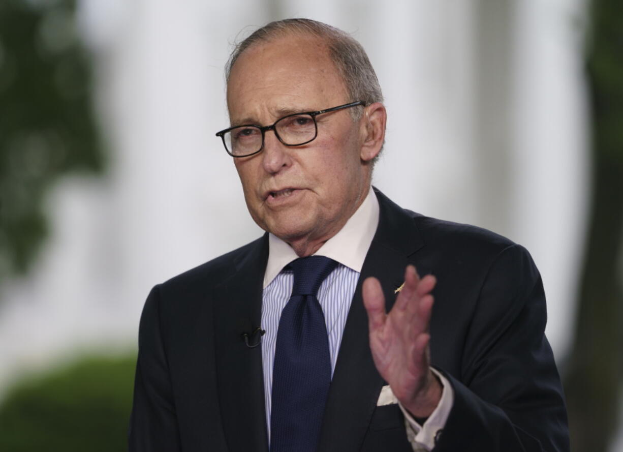 White House chief economic adviser Larry Kudlow speaks during a television interview outside the West Wing of the White House, in Washington, Friday, May 18, 2018.