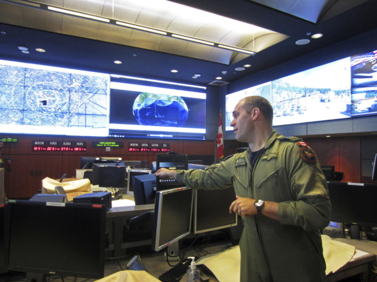 Royal Canadian Air Force Col. Travis Morehen speaks in the North American Aerospace Defense Command command center Thursday inside Cheyenne Mountain, Colo.