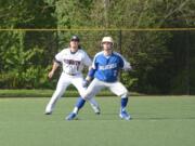 La Center baserunner Hayden Williamson (2) and King's Way's Riley Danberg monitor a potential stolen base during the Knights' 12-4 win over the Wildcats on Friday, May 4, 2018 at Luke Jensen Sports Complex (Andy Buhler/ Columbian staff).