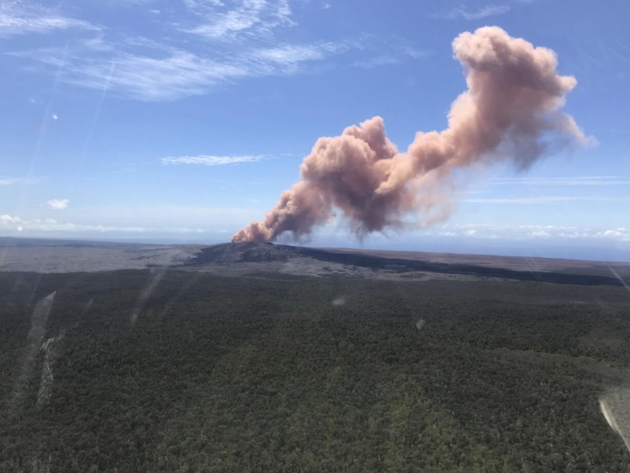 Red ash rises from the Puu Oo vent on Hawaii’s Kilauea Volcano after a magnitude 5.0 earthquake struck the Big Island Thursday in Hawaii Volcanoes National Park. (Kevan Kamibayashi/U.S.