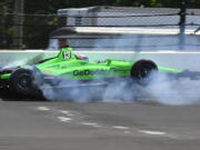 Danica Patrick hits the wall in the second turn during the running of the Indianapolis 500 auto race at Indianapolis Motor Speedway, in Indianapolis Sunday, May 27, 2018.