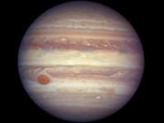 The planet Jupiter when it was at a distance of about 668 million kilometers (415 million miles) from Earth. On Monday, May 21, 2018, scientists reported that an asteroid sharing Jupiter’s orbit, but in reverse, actually hails from a neighboring star system. They say the asteroid, known as 2015 BZ509, has been in this peculiar backward orbit ever since getting sucked into our solar system in the first moments after our solar system formed 4.5 billion years ago. (NASA, ESA, and A.