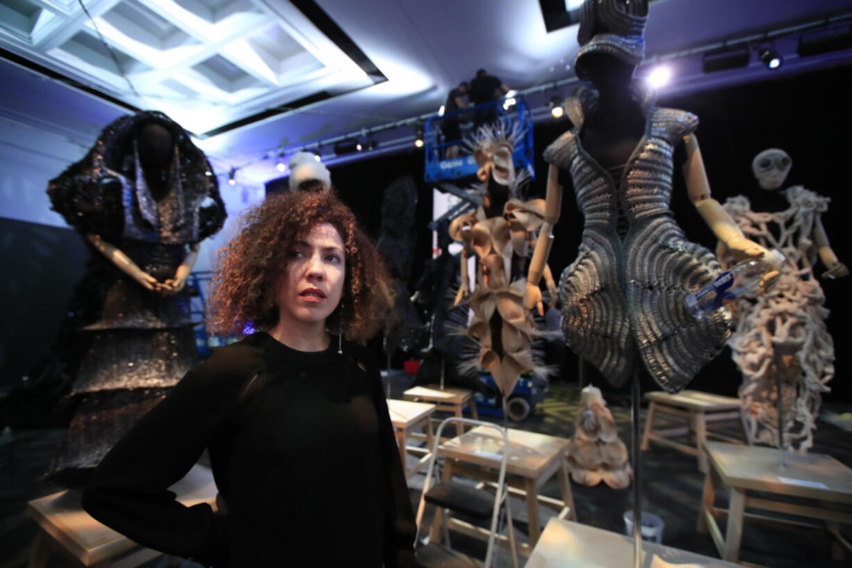 Cuban designer Celia Ledón poses with her fashion creation at the Kennedy Center in Washington, Tuesday, May 8.