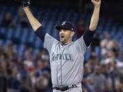 Seattle Mariners starting pitcher James Paxton celebrates after throwing a no-hitter against the Toronto Blue Jays in a baseball game Tuesday, May 8, 2018, in Toronto.