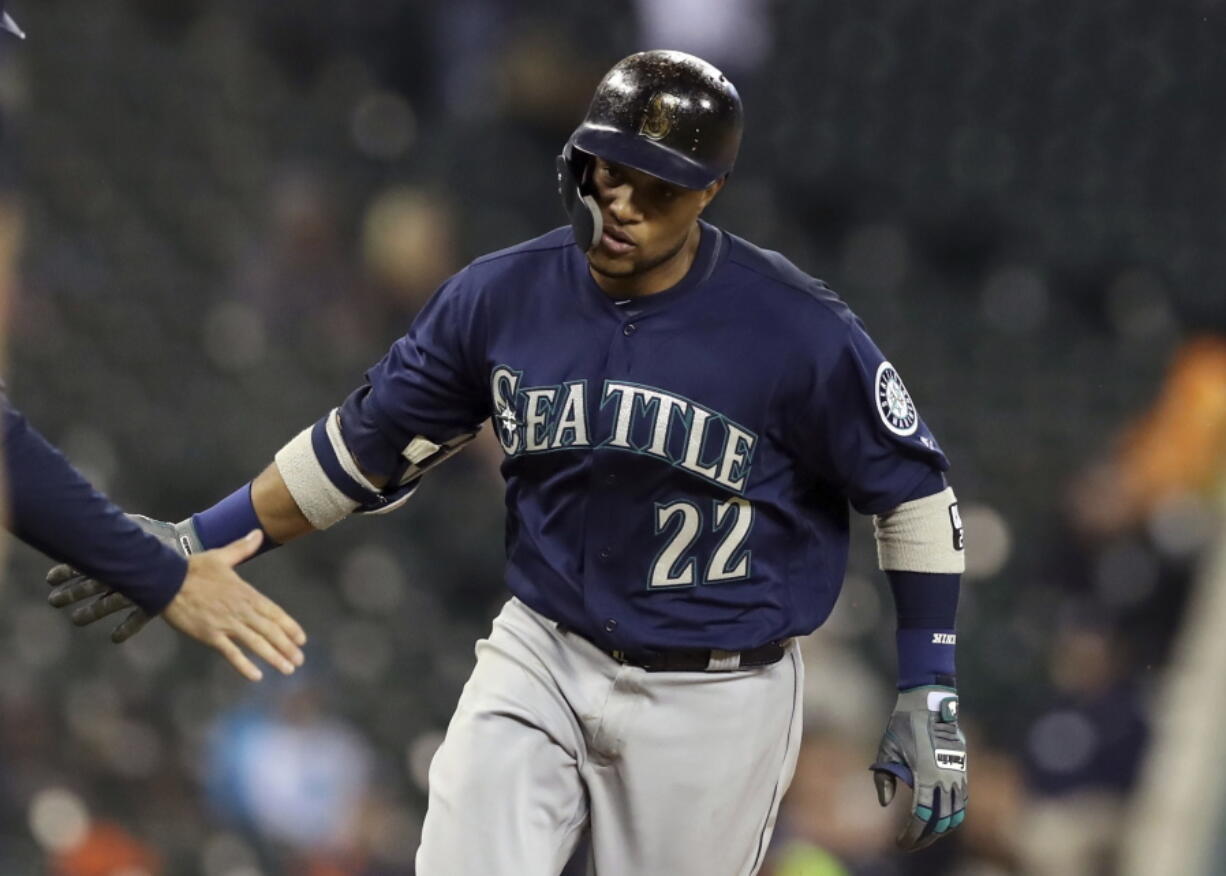 Seattle Mariners’ Robinson Cano rounds third base after hitting a three-run home run during the fifth inning of the second game of a baseball doubleheader against the Detroit Tigers, Saturday, May 12, 2018, in Detroit.