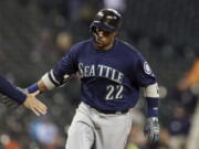 Seattle Mariners’ Robinson Cano rounds third base after hitting a three-run home run during the fifth inning of the second game of a baseball doubleheader against the Detroit Tigers, Saturday, May 12, 2018, in Detroit.