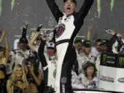 Kevin Harvick celebrates in Victory Lane after winning the NASCAR All-Star auto race at Charlotte Motor Speedway in Concord, N.C., Saturday, May 19, 2018.