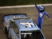 Kevin Harvick (4) celebrates after winning the NASCAR Cup Series auto race at Kansas Speedway on Saturday, May 12, 2018, in Kansas City, Kan.