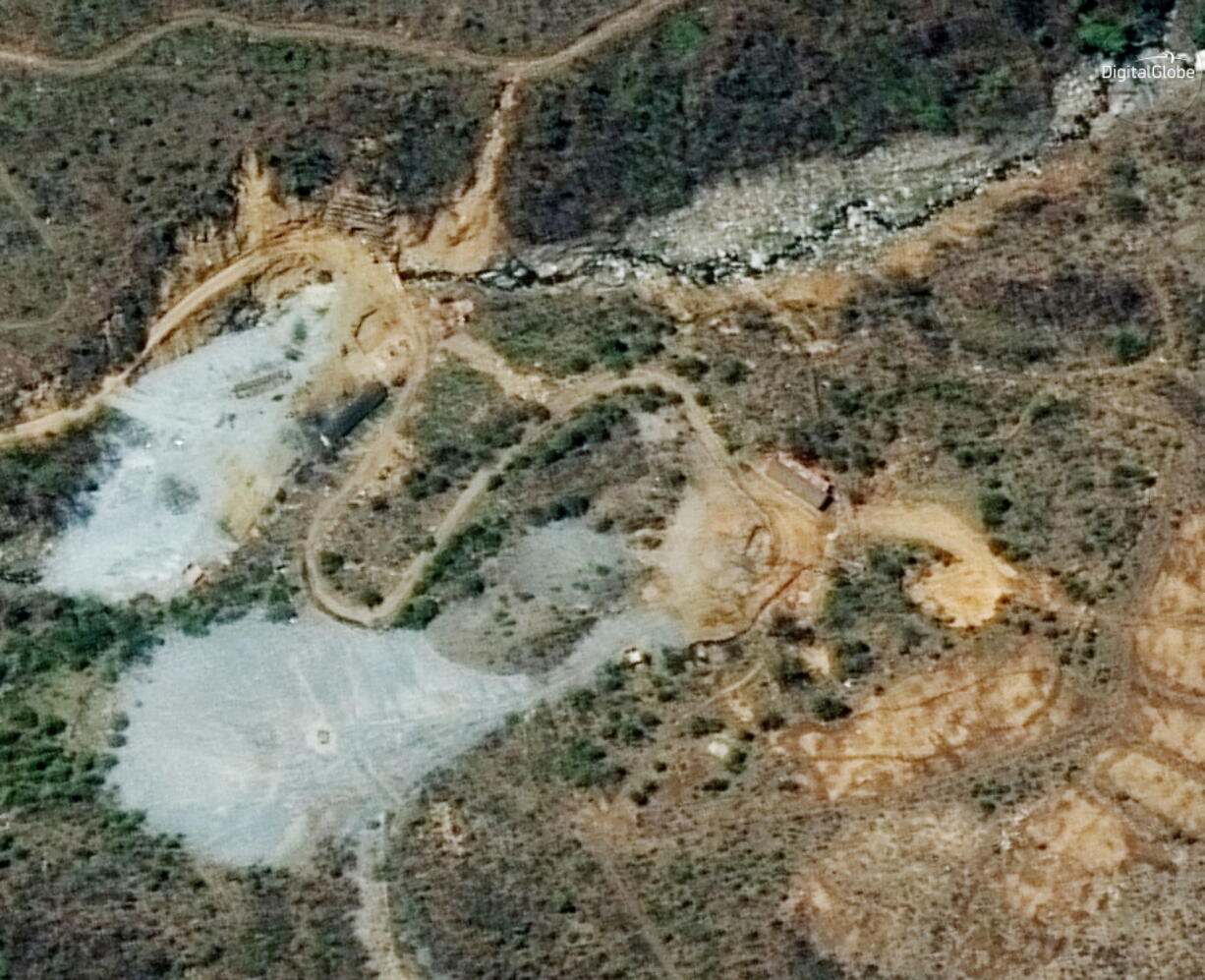 This May 7 satellite image shows the nuclear test site in Punggye-ri, North Korea. North Korea has carried out what it says is the demolition of its nuclear test site in the presence of foreign journalists. The demolition happened Thursday at the site deep in the mountains of the North’s sparsely populated northeast. The planned closing was previously announced by leader Kim Jong Un ahead of his planned summit with U.S. President Donald Trump next month.