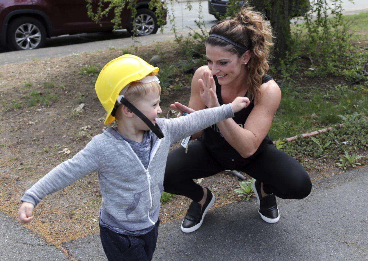 Lizabeth Loud, 32, plays with her son Eaghan, 2, at their home in Randolph, Mass. Loud says her month, when forced into treatment for her heroin and prescription painkiller addiction, was the start of a personal turnaround. She’s been sober about a year and a half. But critics, including many doctors, law enforcement officials and civil rights advocates, caution that success stories like Loud’s are an exception. Research suggests involuntary commitment largely doesn’t work and could raise the danger of overdose for those who relapse after treatment.