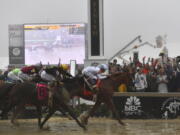 Justify with Mike Smith atop wins the 143rd Preakness Stakes horse race at Pimlico race track, Saturday, May 19, 2018, in Baltimore. Bravazo with Luis Saez aboard wins second with Tenfold with Ricardo Santana Jr. atop places.