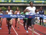 Caster Semenya, right, wins the wome's 800 meters at the Prefontaine Classic track and field meet in Eugene, Ore., Saturday, May 26, 2018.