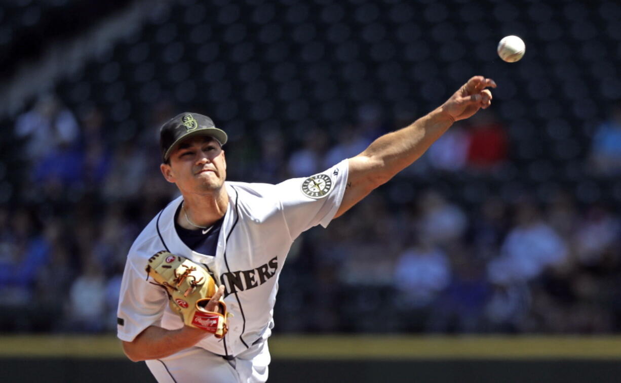 Seattle Mariners starting pitcher Marco Gonzales throws against the Texas Rangers in the first inning of a baseball game Monday, May 28, 2018, in Seattle.