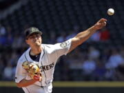 Seattle Mariners starting pitcher Marco Gonzales throws against the Texas Rangers in the first inning of a baseball game Monday, May 28, 2018, in Seattle.