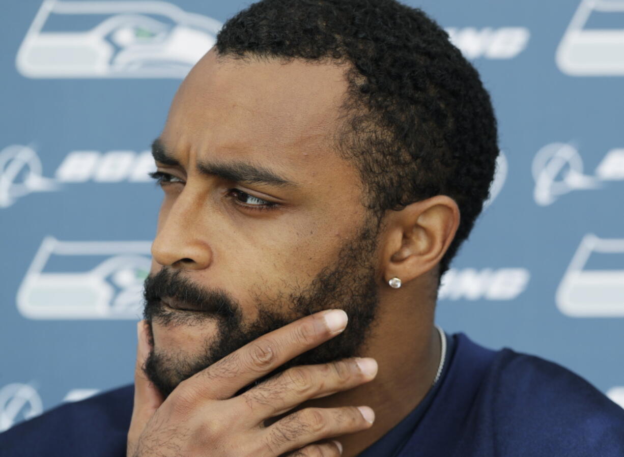 Seattle Seahawks wide receiver Doug Baldwin talks to reporters following NFL football practice, Thursday, May 24, 2018, in Renton, Wash. (AP Photo/Ted S.