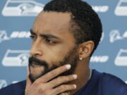 Seattle Seahawks wide receiver Doug Baldwin talks to reporters following NFL football practice, Thursday, May 24, 2018, in Renton, Wash. (AP Photo/Ted S.