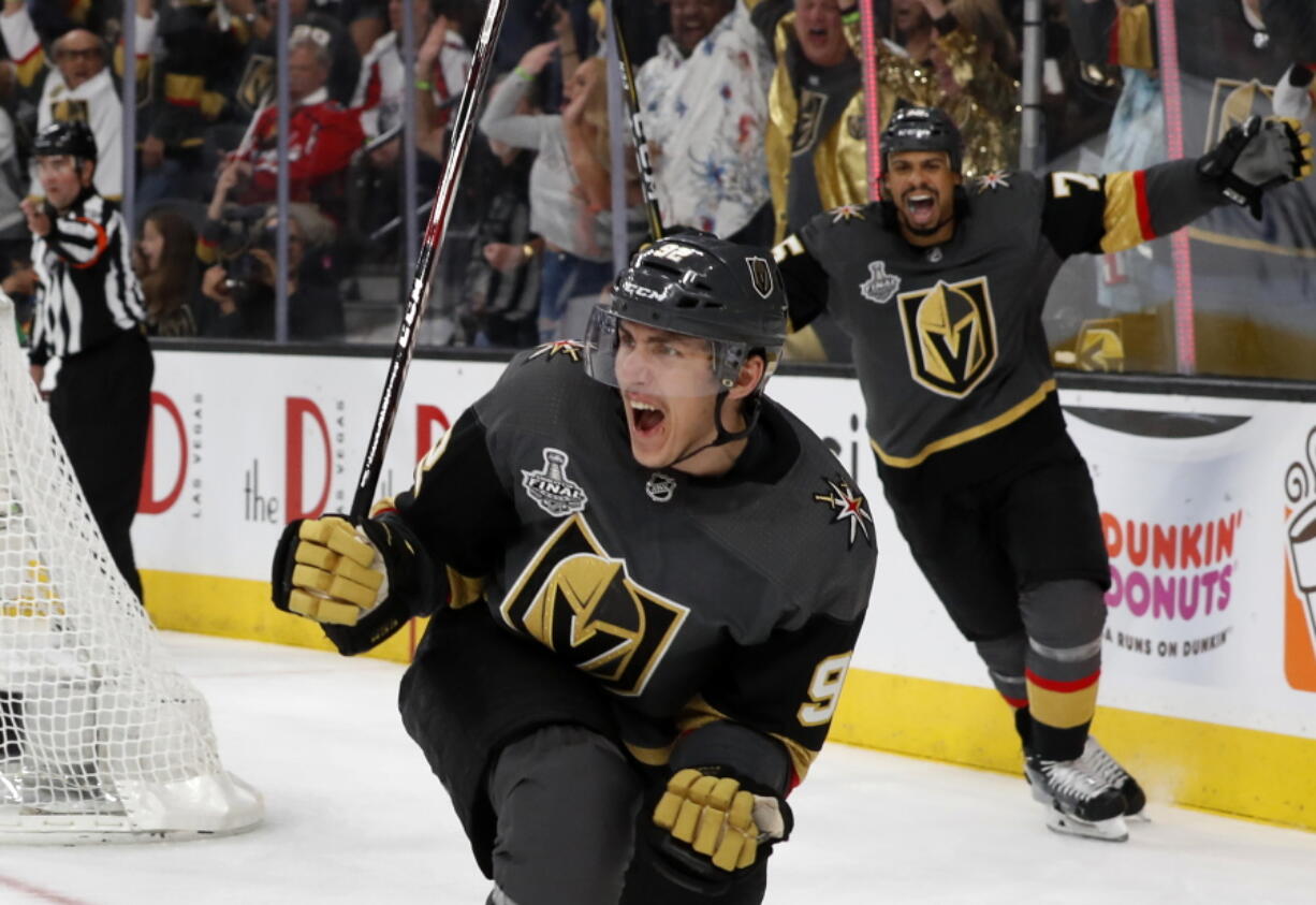 Vegas Golden Knights left wing Tomas Nosek (92) celebrates a goal in the third period during Game 1 of the NHL hockey Stanley Cup Finals at T-Mobile Arena in Las Vegas Monday, May 28, 2018. Ryan Reaves (75) is at right.