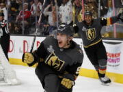 Vegas Golden Knights left wing Tomas Nosek (92) celebrates a goal in the third period during Game 1 of the NHL hockey Stanley Cup Finals at T-Mobile Arena in Las Vegas Monday, May 28, 2018. Ryan Reaves (75) is at right.