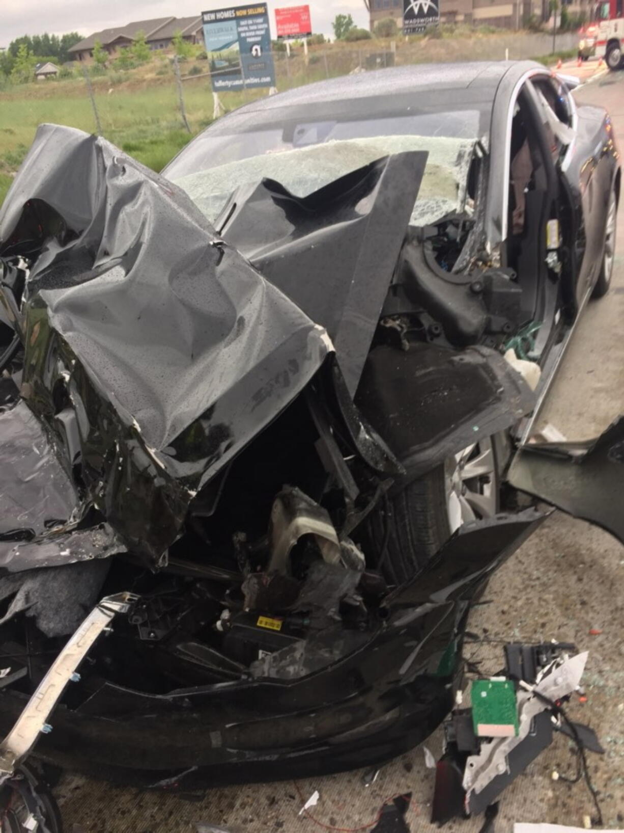 A traffic collision involving a Tesla Model S sedan with a Fire Department mechanic truck stopped at a red light Friday in South Jordan, Utah. Witnesses indicated the Tesla Model S did not brake prior to impact.