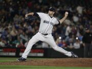 Seattle Mariners starting pitcher James Paxton throws to a Detroit Tigers batter during the ninth inning of a baseball game, Saturday, May 19, 2018, in Seattle. Paxton threw a three-hitter as the Mariners won 7-2. (AP Photo/Ted S.