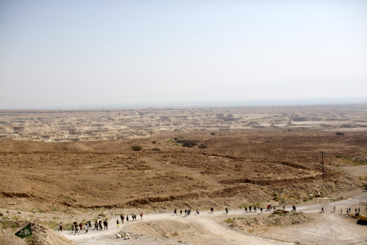 A Birthright Israel group tours Masada, the ancient fortress on a plateau in the desert overlooking the Dead Sea in Israel in 2015.