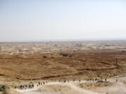 A Birthright Israel group tours Masada, the ancient fortress on a plateau in the desert overlooking the Dead Sea in Israel in 2015.