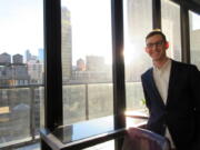 Then Lonely Planet CEO Daniel Houghton at a rooftop bar in in New York on March 2, 2017. Houghton took over the venerable travel publishing company Lonely Planet at age 24 in 2013. On Tuesday the company said Houghton “has stepped away from Lonely Planet to take on a CEO role at another company.” (AP Photo/Beth J.