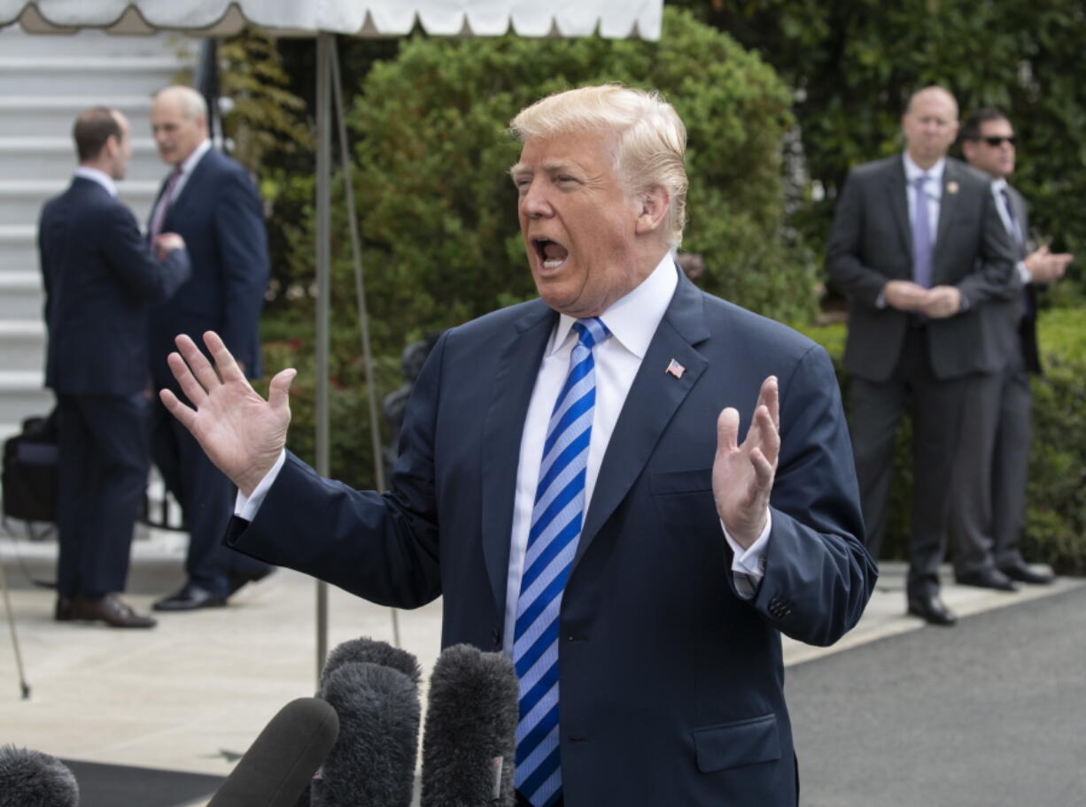 President Donald Trump tells reporters a time and place for his meeting with North Korea’s Kim Jong Un has been set and will be announced soon, as he leaves for Dallas to address the National Rifle Association, in Washington, Friday, May 4, 2018. (AP Photo/J.