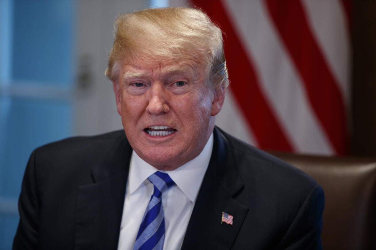 President Donald Trump speaks during a roundtable on immigration policy in California in the Cabinet Room of the White House, Wednesday, May 16, 2018, in Washington.