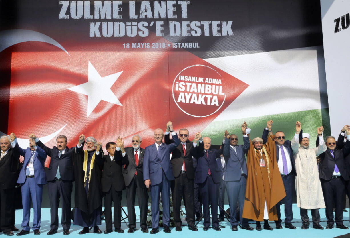 Turkish President Recep Tayyip Erdogan salutes a rally in solidarity with Palestinians before an extraordinary summit of the Organization of Islamic Cooperation (OIC), in Istanbul, Turkey, on May 18. Turkey has called on Muslim nations to stand with Palestinians and to work to stop countries joining the United States in relocating their Israeli embassy from Tel Aviv to Jerusalem.