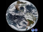 The Earth’s western hemisphere at 12:00 p.m. EDT on May 20, 2018 made by the new GOES-17 satellite, using the Advanced Baseline Imager (ABI) instrument. The weather satellite observes Earth from about 22,300 miles above the surface. Despite a serious cooling problem, the newest U.S. weather satellite has produced sharp snapshot of Earth. On May 23, 2018, NOAA reported that critical infrared sensors in the satellite’s main instrument were not staying cold enough.