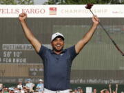 Jason Day reacts after playing partner Nick Watney’s birdie putt on 18 at the Wells Fargo Championship golf tournament at Quail Hollow Club in Charlotte, N.C., Sunday, May 6, 2018. (AP Photo/Jason E.