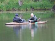 Anglers fish for trout in Ice House Lake in the Columbia River Gorge. Trout fishing continues to be very good in southwest Washington lakes.