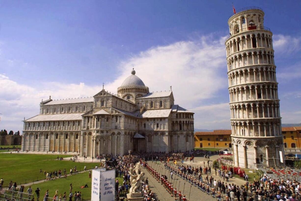 The leaning tower, right, and the Duomo basilica in Pisa, Italy, are seen in June 2001 during celebrations marking the end of restoration project on the tower.