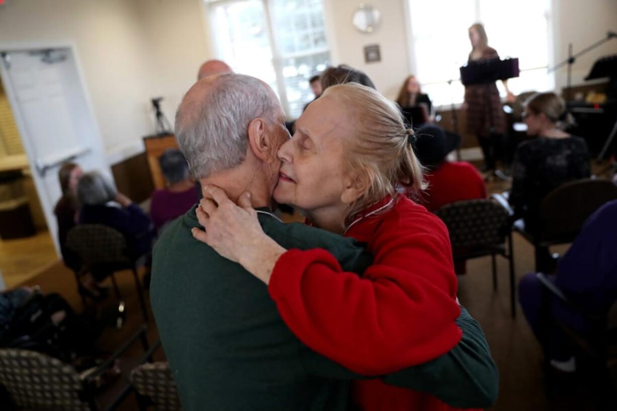 Silverado Memory Care resident Verna Sadock, right, dances with her husband Bob Hirsch as musicians perform.