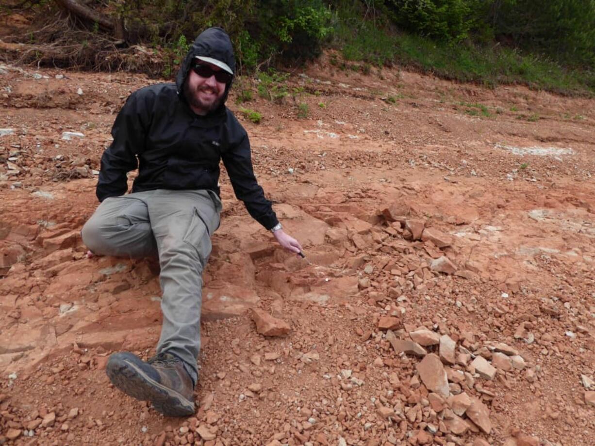 Christian Kammerer on a trip to Kotelnich, pointing out the fossiliferous layer where Gorynychus and Nochnitsa came from. Courtesy N.C.