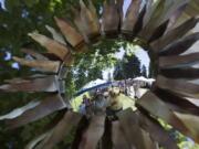 Courtesy Clark County Public Health A metal sunflower reflects a view of last year’s Recycled Arts Festival.