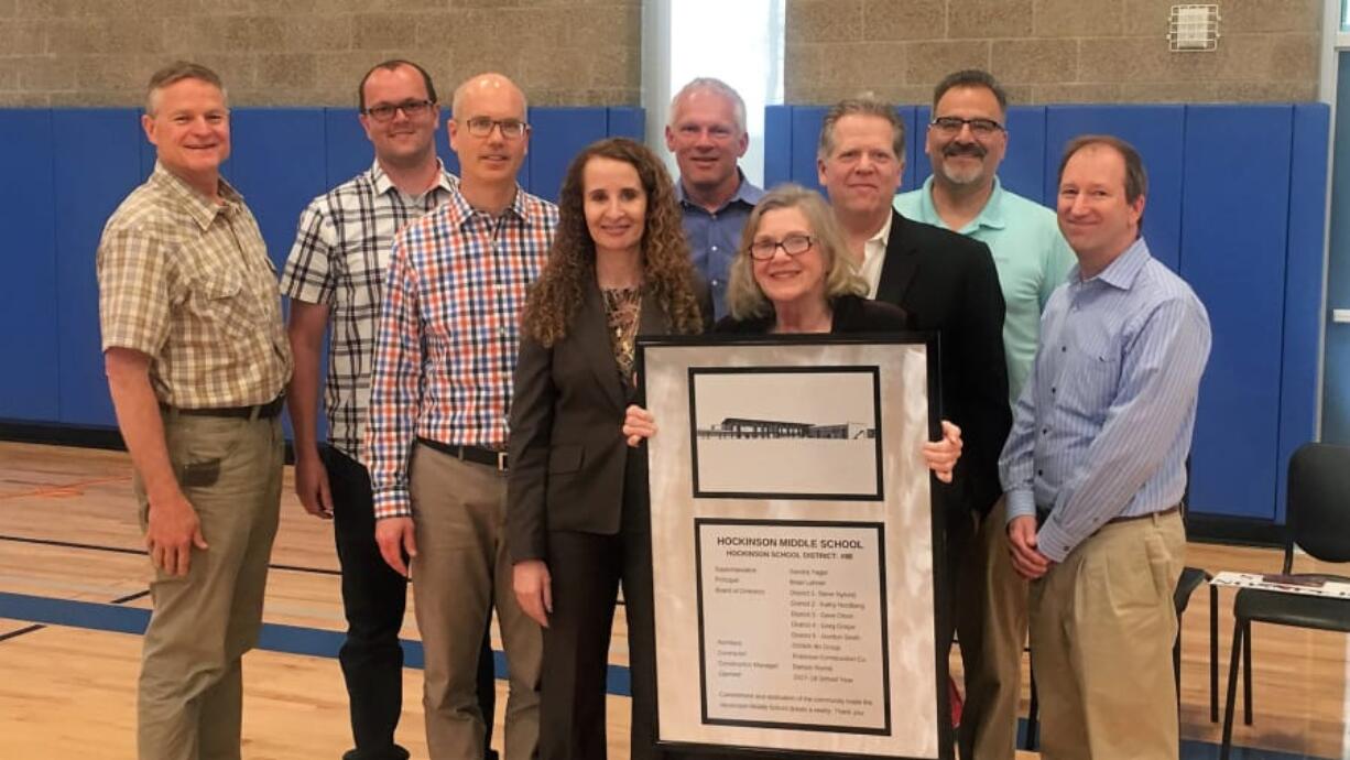 Brush Prairie: The new Hockinson Middle School was dedicated at a ceremony on May 9. From left: School board Director Dave Olson, Bryan Kenney with Robinson Construction, Matthew Braun with DOWA-IBI Group, Superintendent Sandra Yager, district construction manager Damon Rochè, Board Chairwoman Kathy Nordberg and School board directors Greg Gospe, Gordon Smith and Steve Nylund.