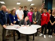 Felida: Washington State Superintendent of Public Instruction Chris Reykdal signs new statewide technology standards during a visit to Skyview High School.